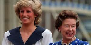 Diana,Princess of Wales,left,and Queen Elizabeth II smile to well-wishers in London in 1987.