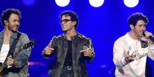 Jonas Brothers at Rod Laver Arena:on their first-ever Australian tour,greeted by rapturous cheers.