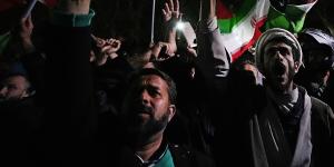 Iranian demonstrators chant slogans during an anti-Israeli gathering in front of the British Embassy in Tehran,Iran on Sunday.