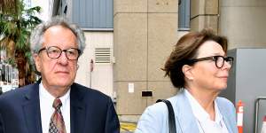 Geoffrey Rush,with his wife Jane Menelaus,at the Federal Court in Sydney on Monday.