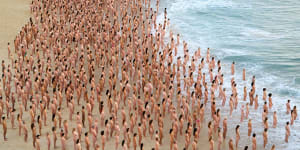 Sydneysiders stripped to take part in a Spencer Tunick shoot at Bondi Beach last year.