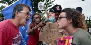 Competing protesters clash outside Planned Parenthood in Missouri following the Supreme Court announcement overturning Roe v Wade.