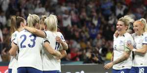 England celebrate their win against Haiti.