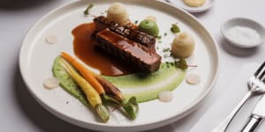 Cootamundra grass-fed lamb loin with heirloom carrots,pomme mousseline and pea puree.