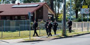 Police detectives and the riot squad were out in force in Doonside on Saturday.