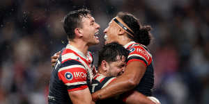 As it happened:Roosters march towards top-four finish with big win in wet