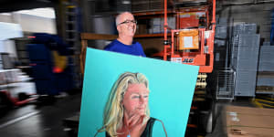 Artist John Klein delivers his portrait of actress Tina Bursill to the Art Gallery of NSW loading dock this week.