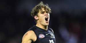 Charlie Curnow celebrates a goal in June 2019,against the Western Bulldogs,just before he was injured.