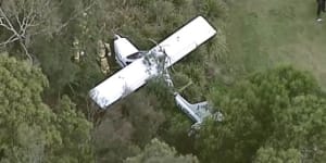 Two men escape with minor injuries after plane lands on golf course