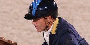 Andrew Hoy rides to a medal.