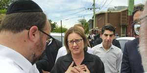 Premier Jacinta Allan with community members outside the synagogue.