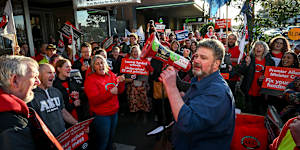 Australian Education Union president Justin Mullaly addresses teacher protesting outside the office of Education Minister Ben Carroll in Niddrie last month.