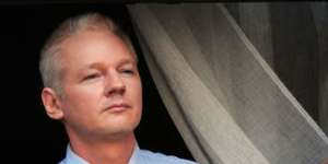 Julian Assange makes a statement on the balcony of the Ecuadorian embassy in London last year.