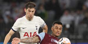 Ben Davies of Hotspur and Gianluca Scamacca of West Ham contest for the ball.
