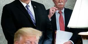 Secretary of State Mike Pompeo,left,and John R. Bolton,the national security adviser,had differing views on the peace plan.