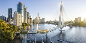 Escalating construction costs of major projects like the Kangaroo Point green bridge have forced a 10 per cent council spending cut.