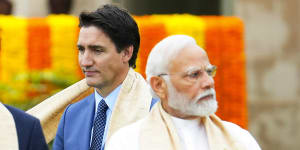 Canada’s Prime Minister Justin Trudeau walks past Indian Prime Minister Narendra Modi in Delhi in September.