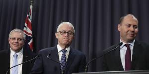 Then Treasurer Scott Morrison watches on as Malcolm Turnbull and Josh Frydenberg address the media on August 20,2018. Within days,Turnbull would be deposed and Morrison would be PM. 