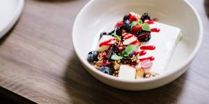 Sprout toasted granola with yoghurt terrine and seasonal fruit.