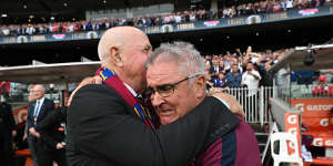 Leigh Matthews embraces Chris Fagan after the siren.