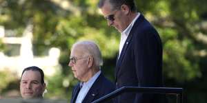 US President Joe Biden and son Hunter leave St Edmond Catholic Church in Rehoboth Beach,Delaware on Saturday.