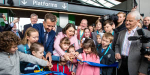 Premier Gladys Berejiklian and Transport Minister Andrew Constance cut the ribbon on Sydney's Metro Northwest line with the help of children.