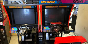 Rebels bikie charged after police find cash and gun hidden in arcade game