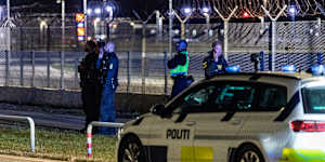 Danish police patrol at Copenhagen Airport in September after a drone incursion.
