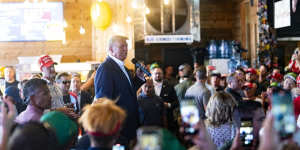 Former President Donald Trump speaks at the Steer N Stein while attending the Iowa State Fair.