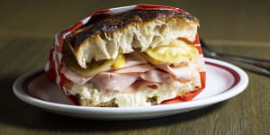 Mortadella,salami,milky-fresh cheese and green tomatoes in focaccia is available at lunch.