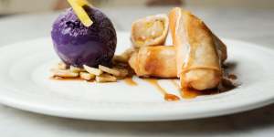 A dessert of turon with ube (purple yam) parfait.