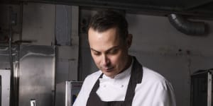 Chef Gavin Carfax-Foster preparing ready meals that he sells under his Westbourne Lane label