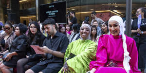 The audience watches on during the Urban Garden Runway at Wesley Place at Melbourne Fashion Week. 