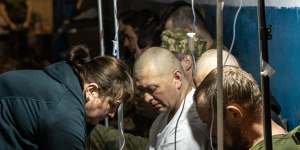 Ukrainian soldiers receive treatment at a frontline field hospital in Popasna,Ukraine.