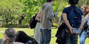 People comfort each other at Florida State University in Tallahassee,following Thursday’s shooting.