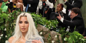 Kim Kardashian struggled to breathe,and walk at the Met Gala,so tight was her corsetry. “Her physical appearance now matches the distortions of her digitally massaged,cartoonish online appearance.”