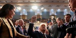 US President Donald Trump departs following a joint session of Congress.