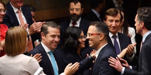NSW Treasurer Daniel Mookhey received a tap on the back from Premier Chris Minns after delivering the budget.