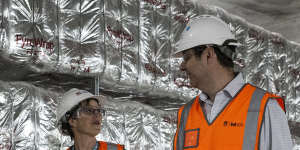 Barangaroo station construction director Claire Moore (left) and Sydney Metro City and Southwest project director Hugh Lawson in an underground cavern.