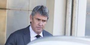 David Gyngell leaves Packer's home on Monday morning.