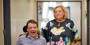 Sandy Guy with her son Liam,who was ripped off and assaulted by his taxi driver.