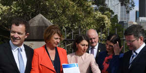 Premier Gladys Berejiklian and Roads Minister Melinda Pavey,second from left,have committed to the first three stages of the F6 extension. 