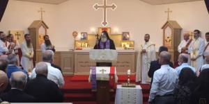 Wearing a white medical eye patch,Bishop Mar Mari Emmanuel returned to a cheering congregation.