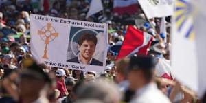 Pilgrims attending the canonisation mass of Carlo Acutis and Pier Giorgio Frassati in St Peter’s Square.
