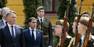 Defence Minister Richard Marles (left) and Chief of Army Lieutenant General Simon Stuart at a ceremony for fallen Ukrainian soliders at the National Army Academy in Lviv on Saturday. 