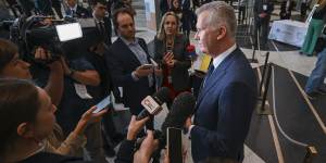 Employment and Workplace Relations Minister Tony Burke holds a press conference during the summit on Thursday.