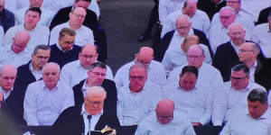 “Elect Vessel” of the Plymouth Brethren Christian Church Bruce D. Hales,left front,preaching earlier this month in Westfield,in the United States.