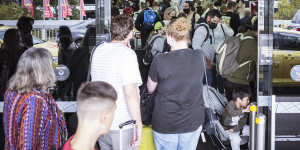 Large queues formed at Melbourne Airport’s terminal 3 departures on Tuesday.
