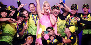 Katy Perry with the Australian team at the MCG.
