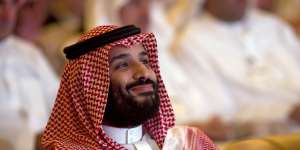 Saudi Crown Prince,Mohammed bin Salman,smiles as he attends the Future Investment Initiative conference.